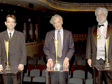 Brad Kessler, Elie Wiesel and Mark Kurlansky with the sculptures designed by Michael Bashaw.